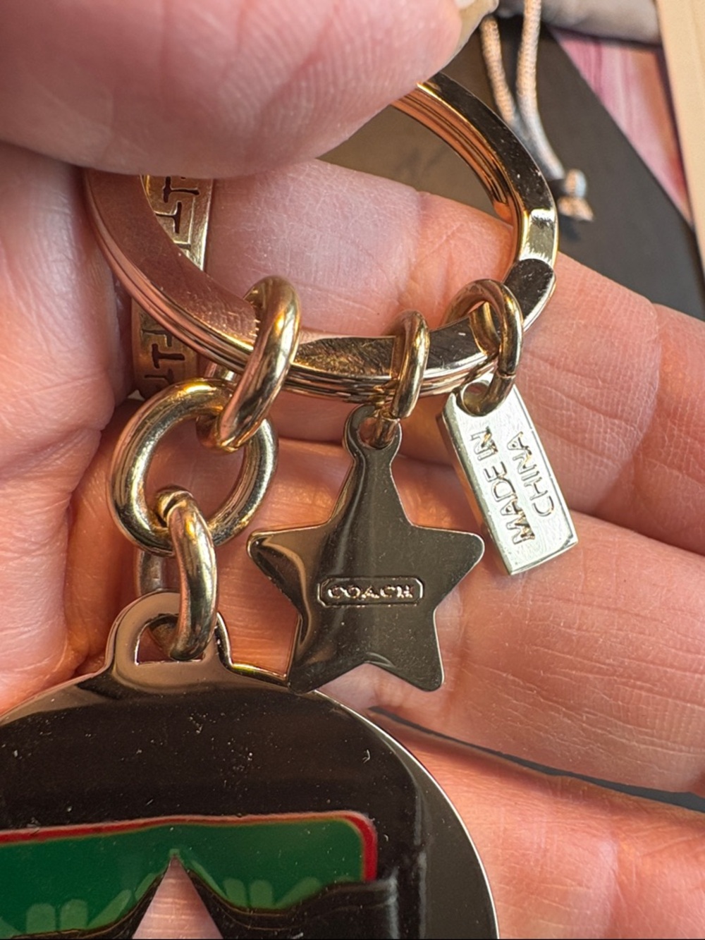 Coach Gold-Tone Star Cutout Keychain with Crystal Accents - Picture 3 of 5